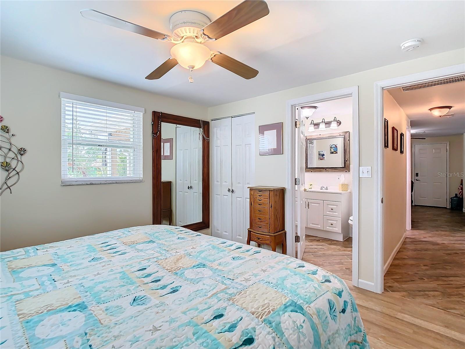 Primary bedroom with bathroom, shower, no tub.