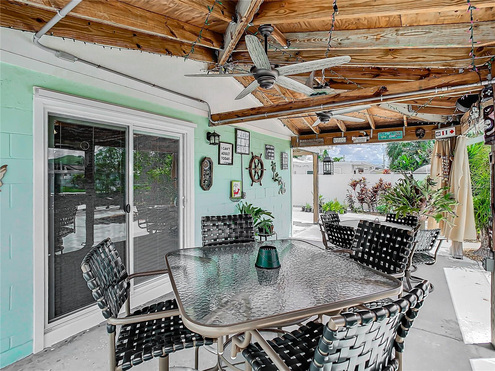 Cover patio with solar curtains for cooler afternoon lounging.