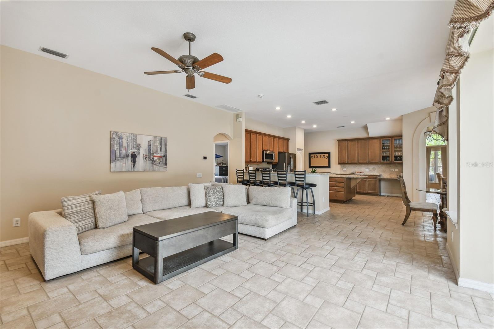 Extra large Family Room - great for gathering - adorned with tile flooring throughout