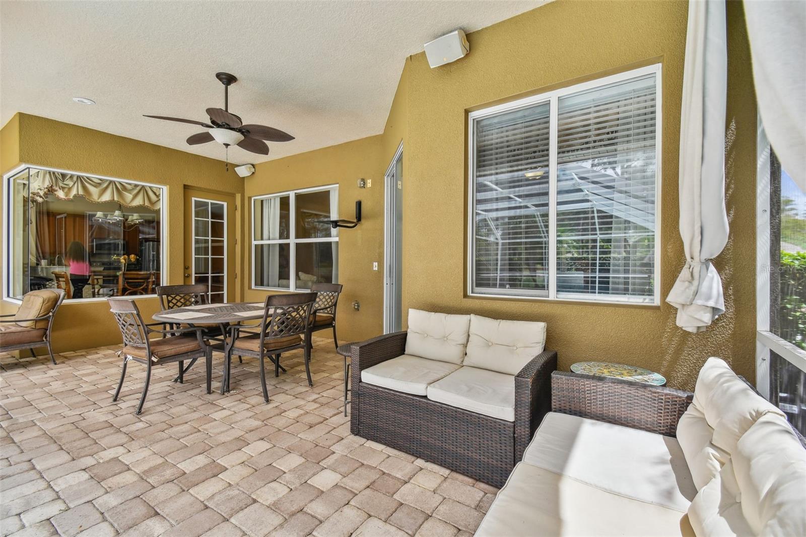 Covered seating areas around pool