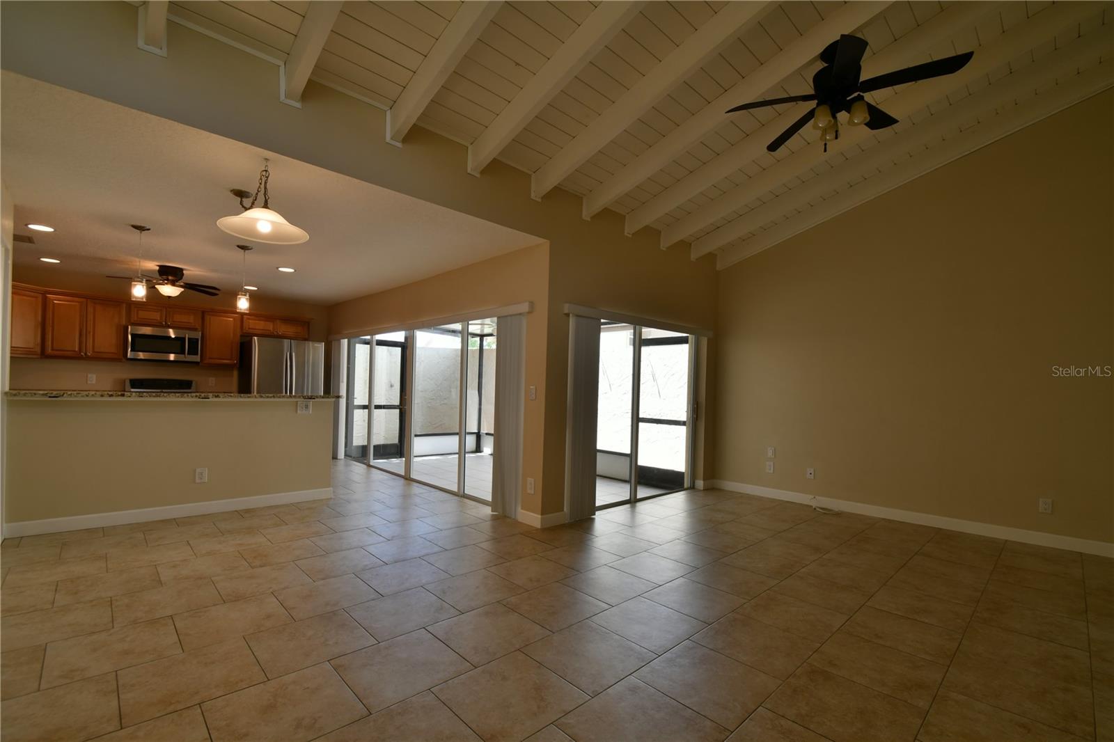 Open floor plan with high ceilings