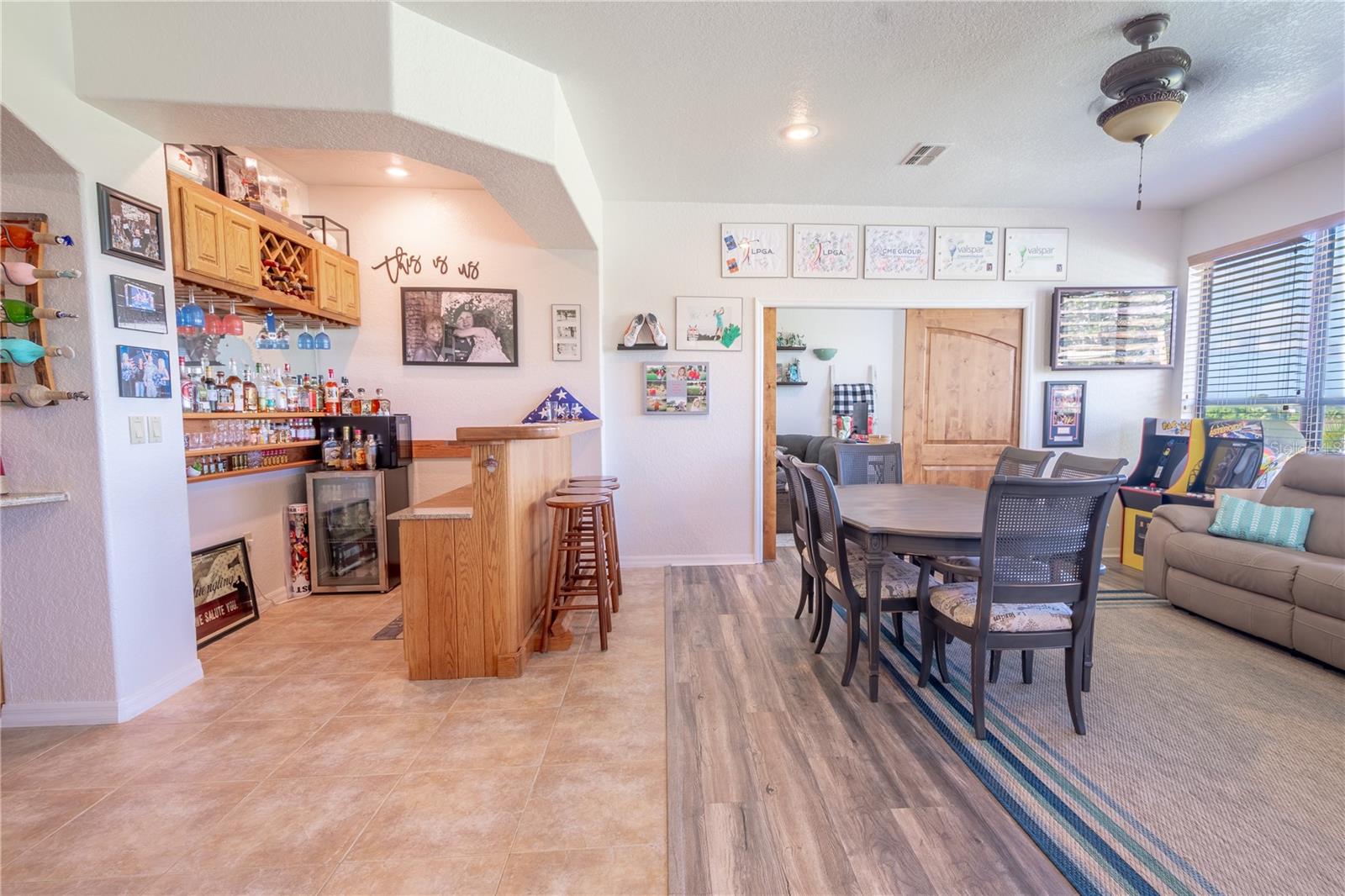 The wet bar is open to the family room ideal for entertaining.