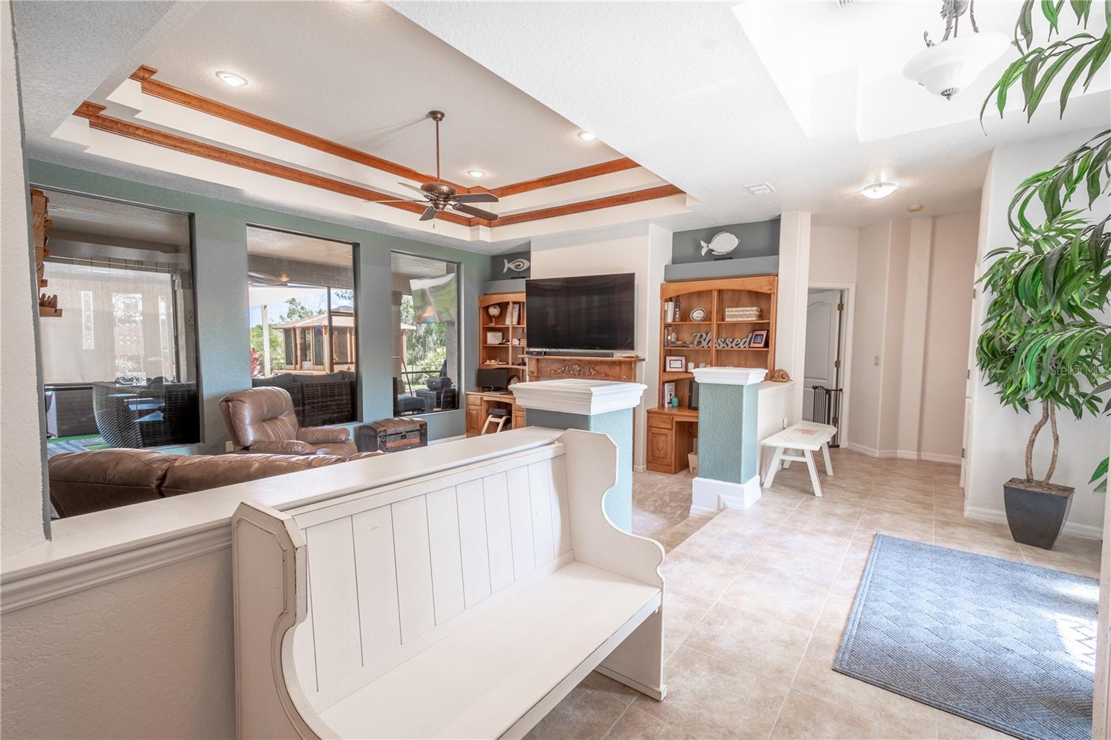 Enter through beveled glass doors into the large welcoming foyer.