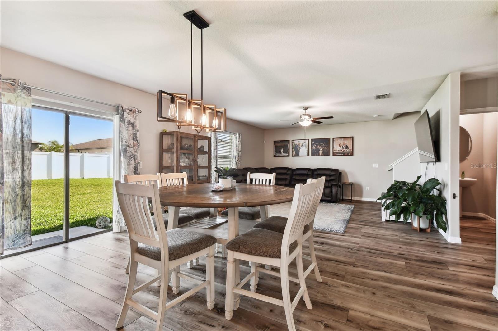 Dining overlooks backyard