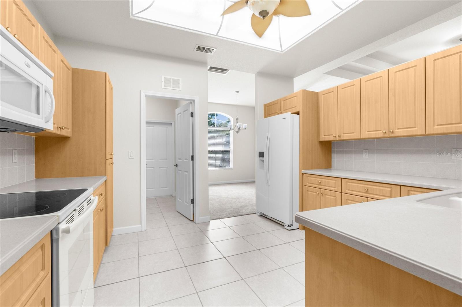 Large kitchen with Corian countertops!