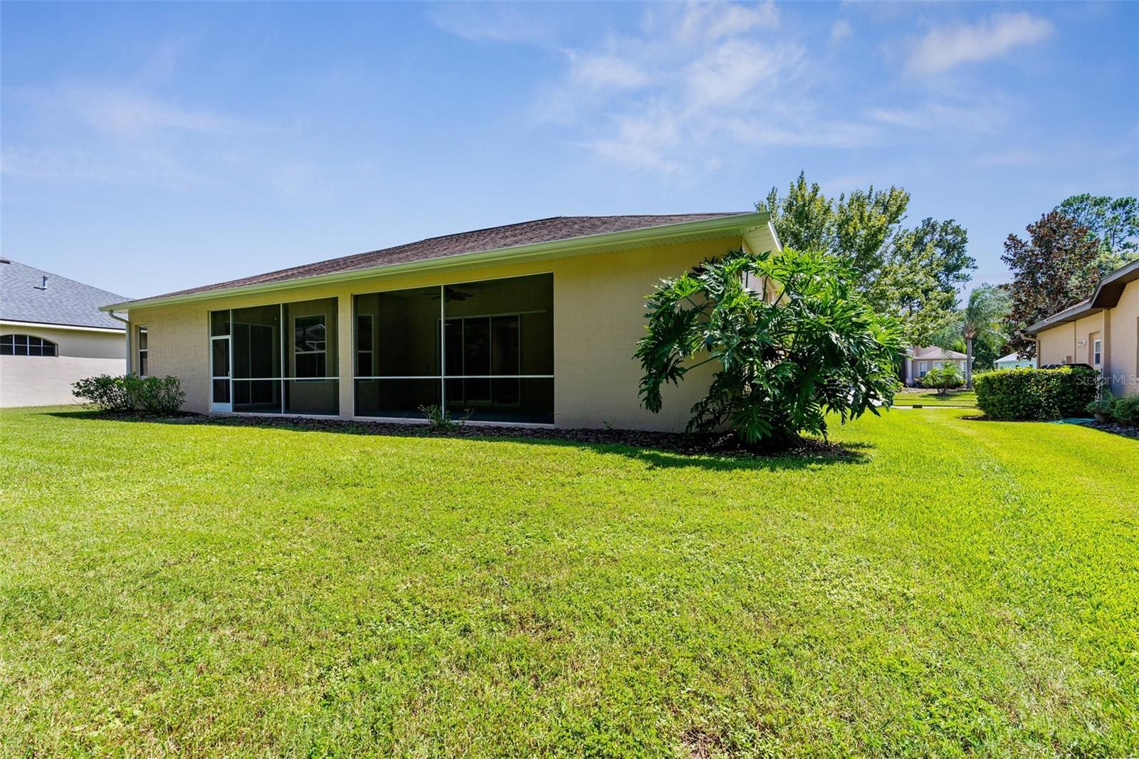 Screened-in and covered lanai for enjoying the Florida weather!