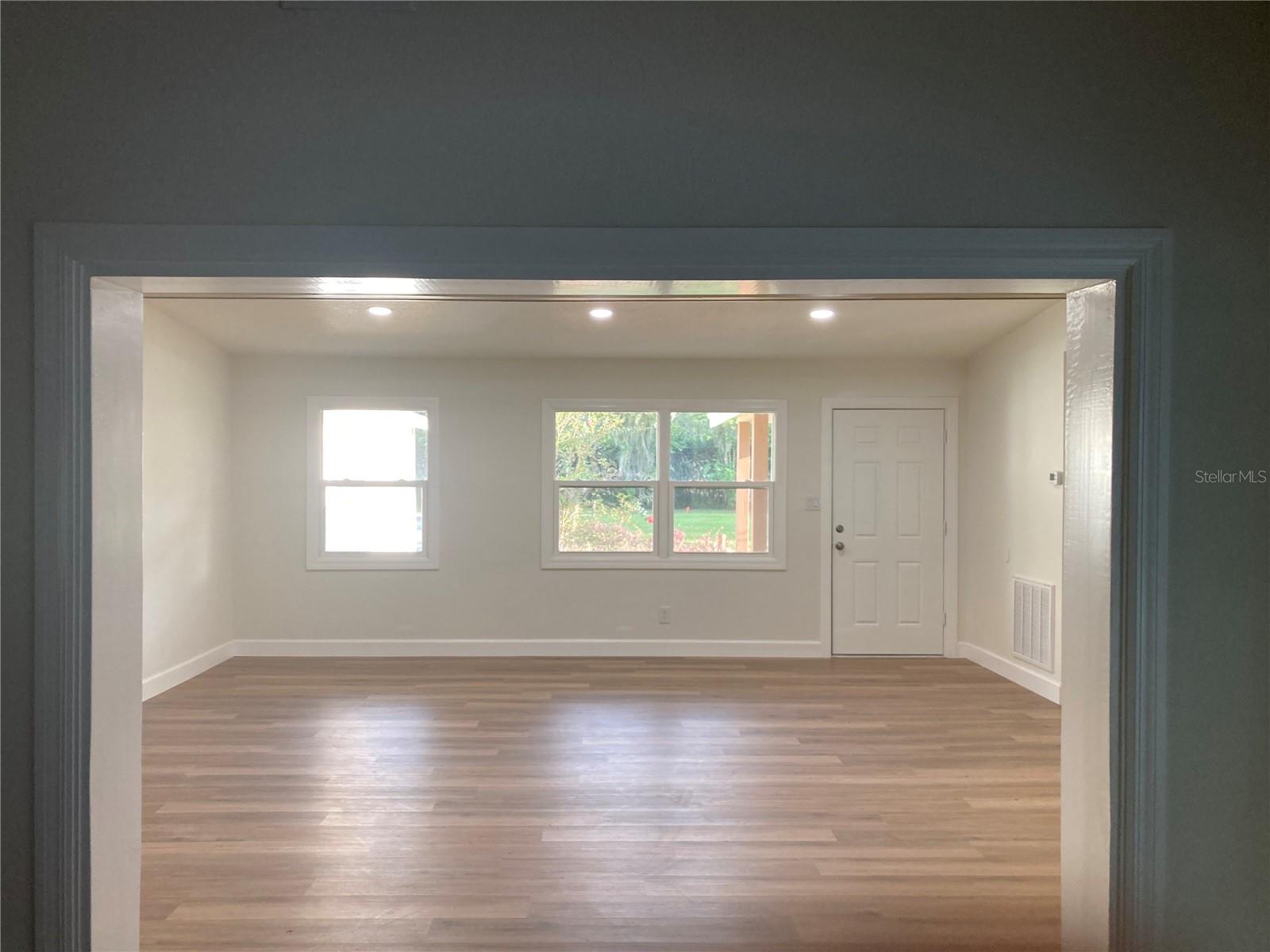 View from Family room to Living/Dining room