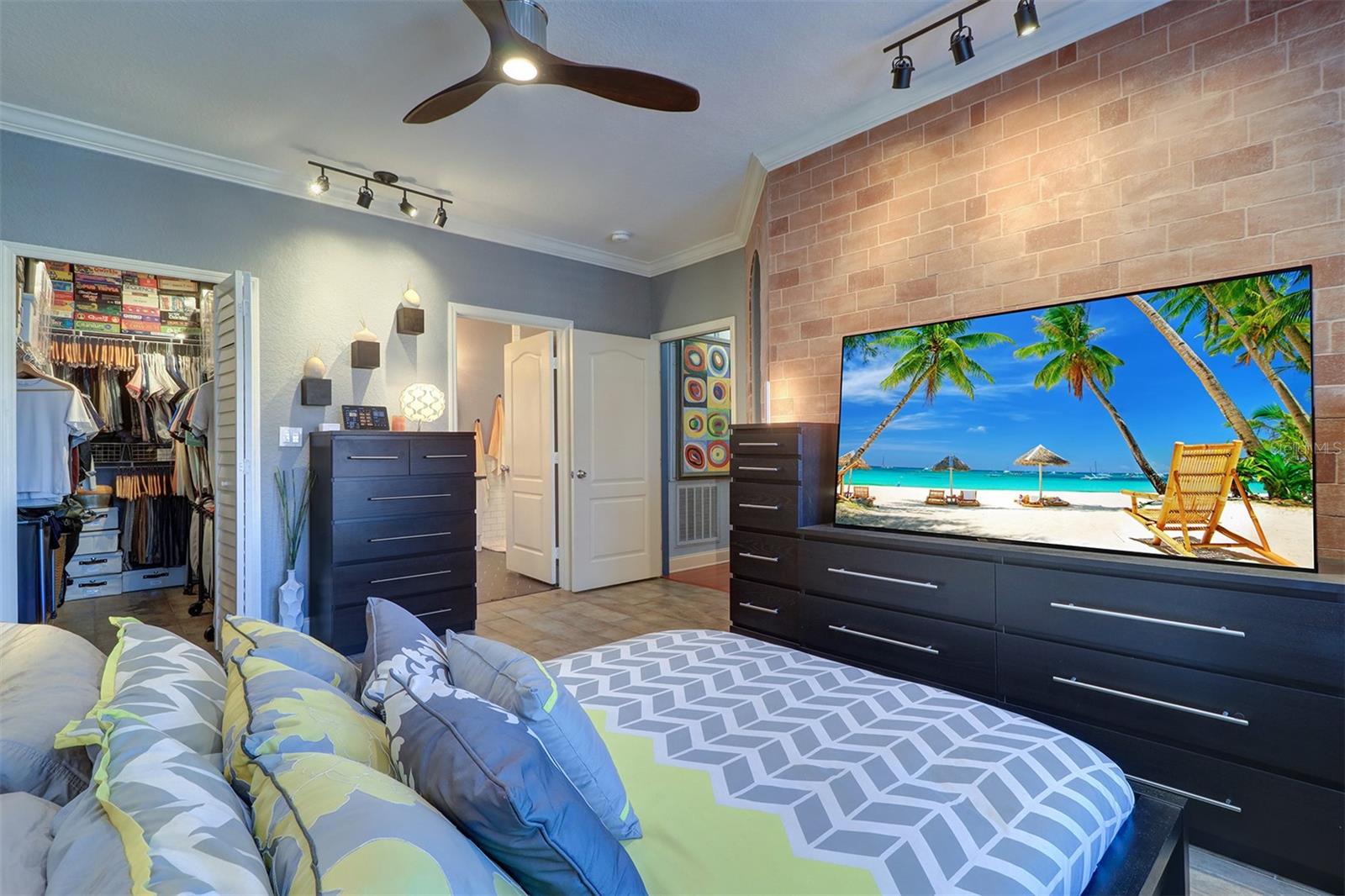 View of the entrance to the en-suite and primary bedroom walk in closet