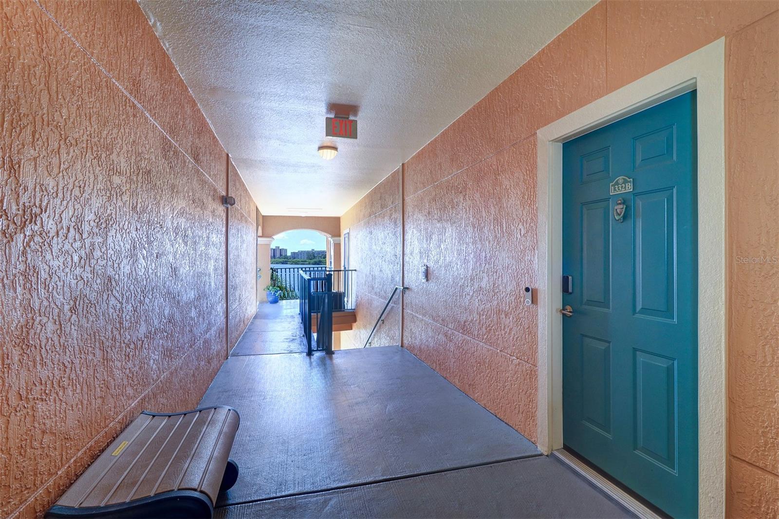 Front door from hallway looking towards the "open bay"