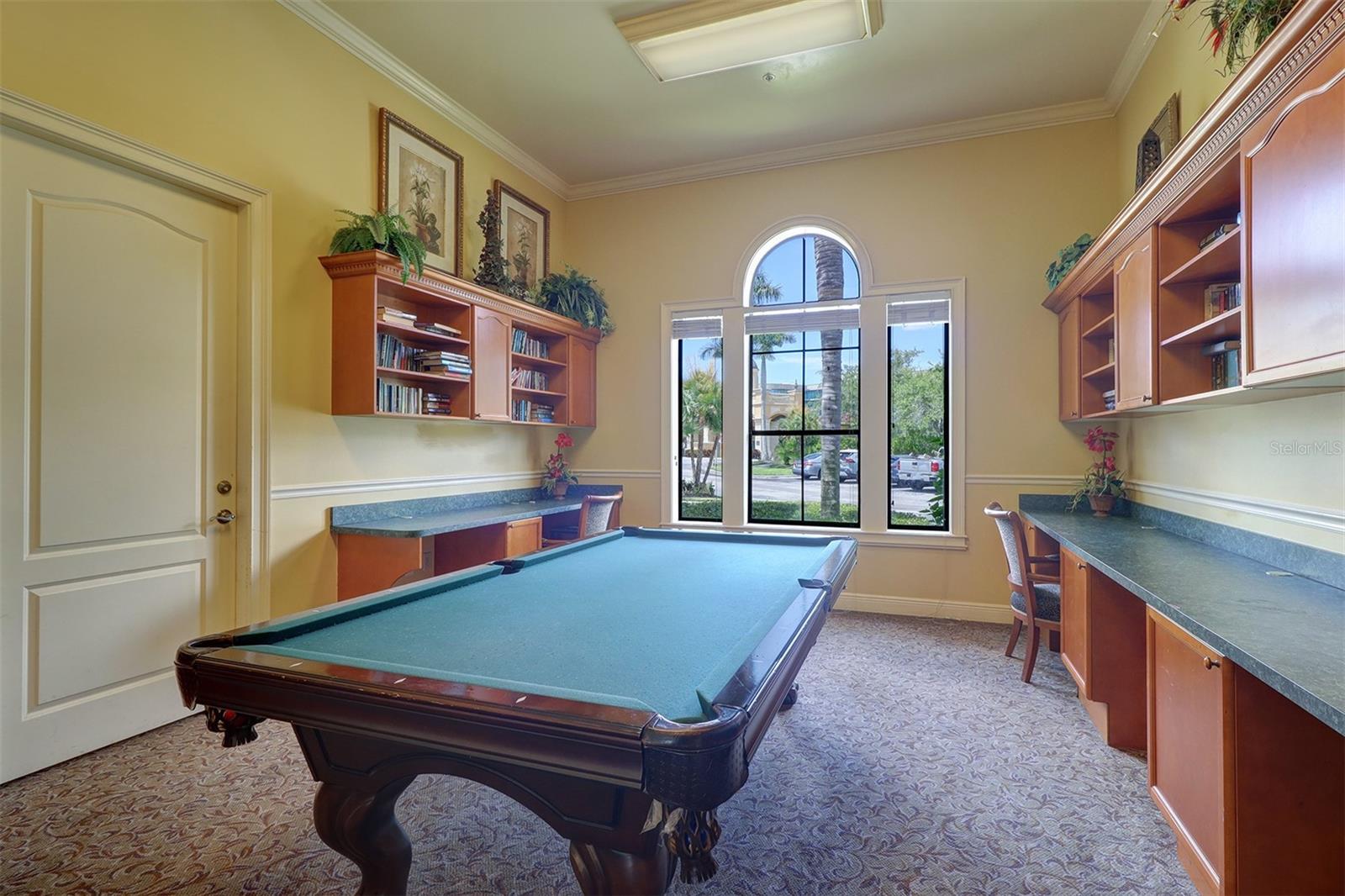 Billiards room with owner's conference room adjacent to the left