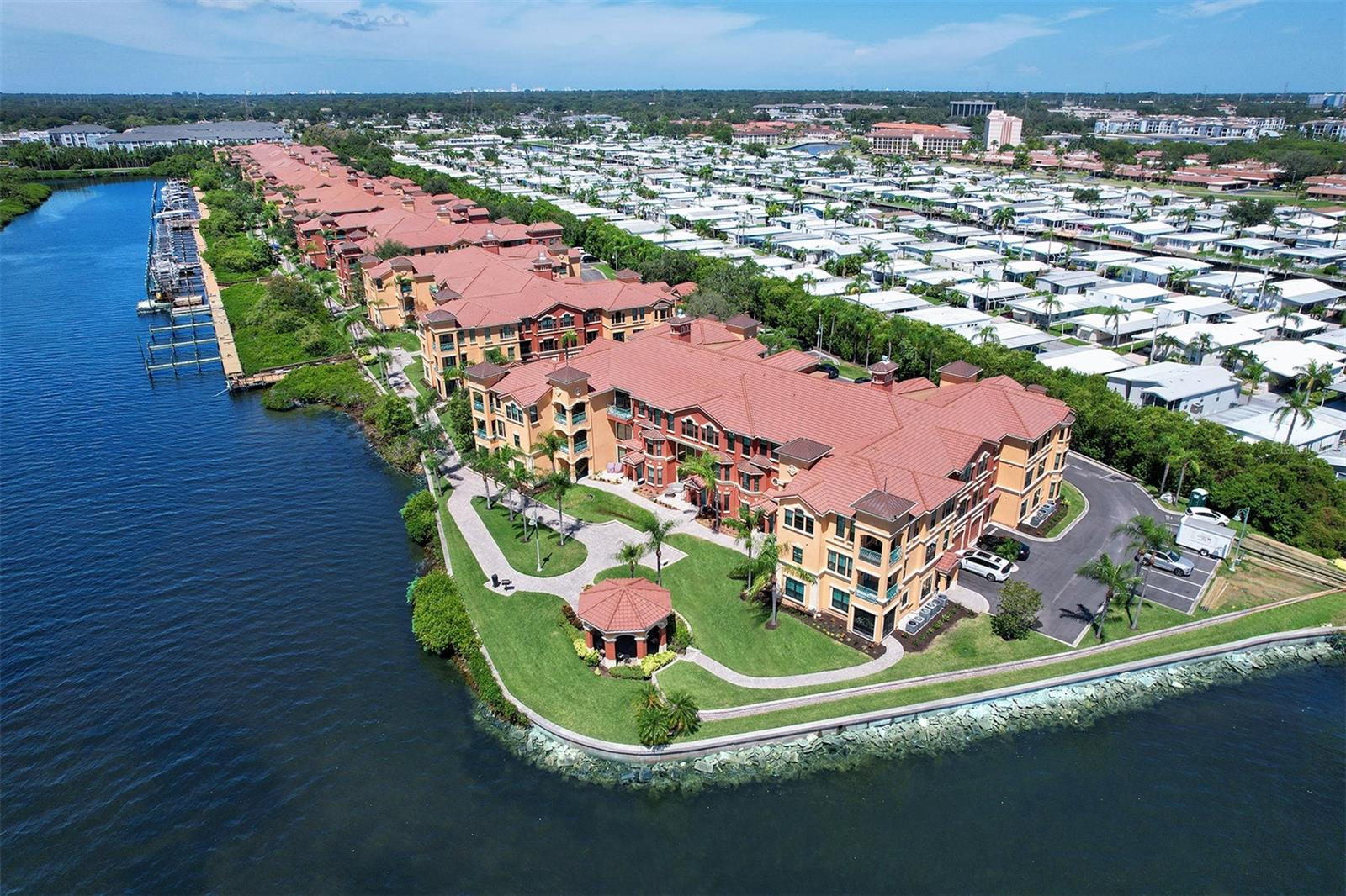 Waterfront photo of Building 13 with gazebo and waterfront promenade