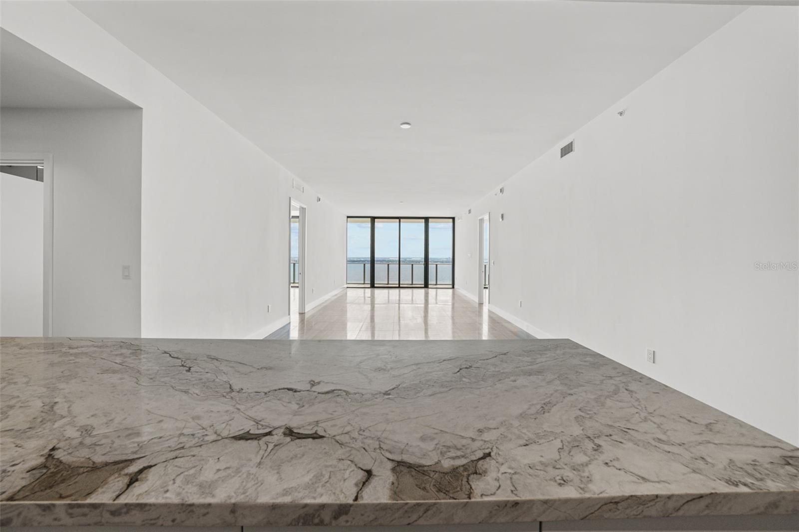 View over kitchen island to balcony