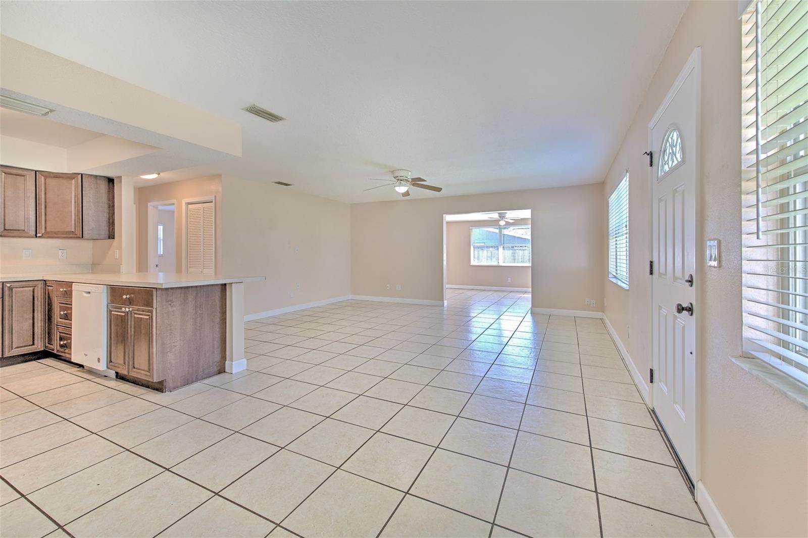 Dinette area with view to the living area, kitchen and flex space