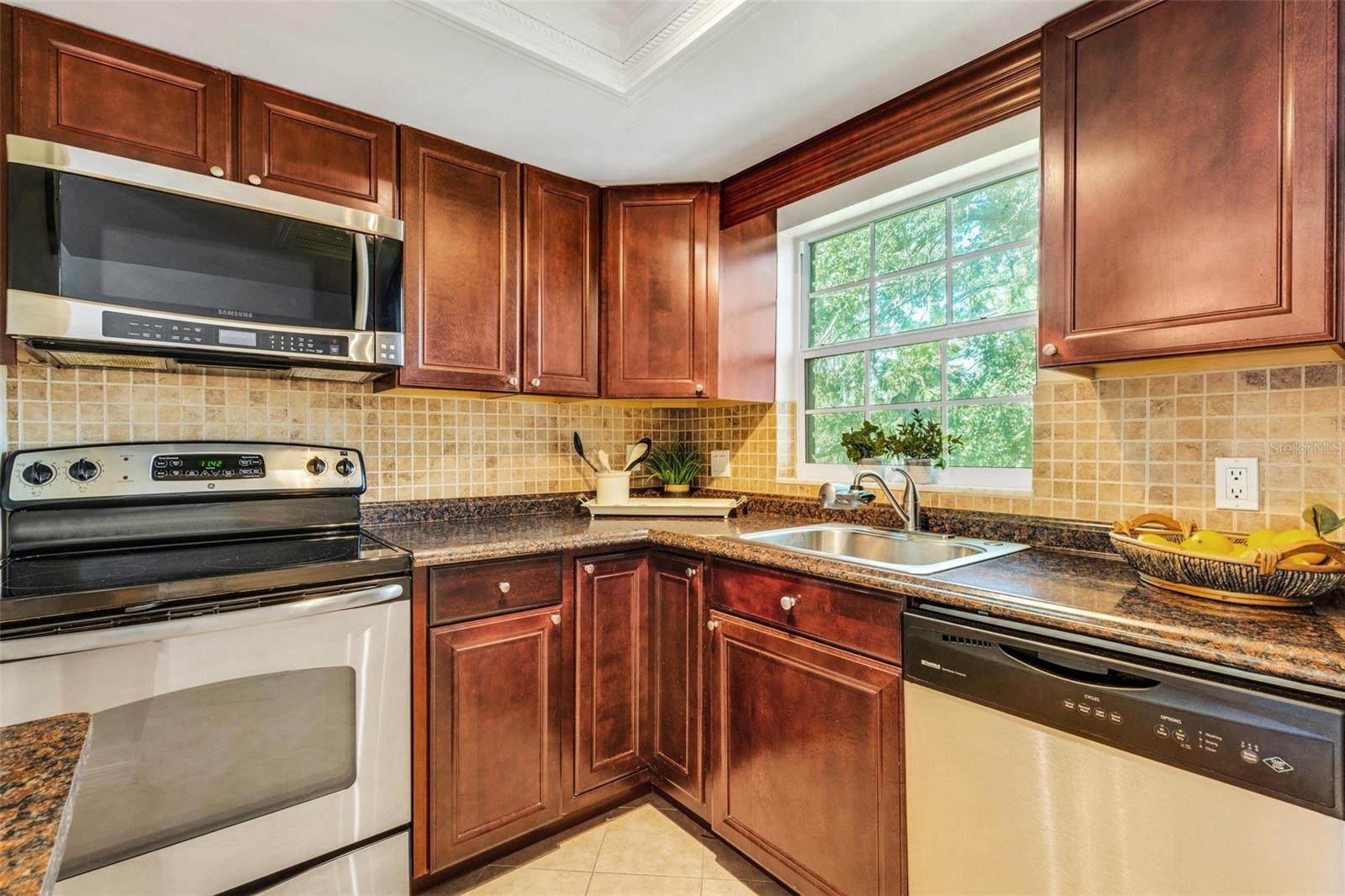 Stainless appliances and solid surface countertops!