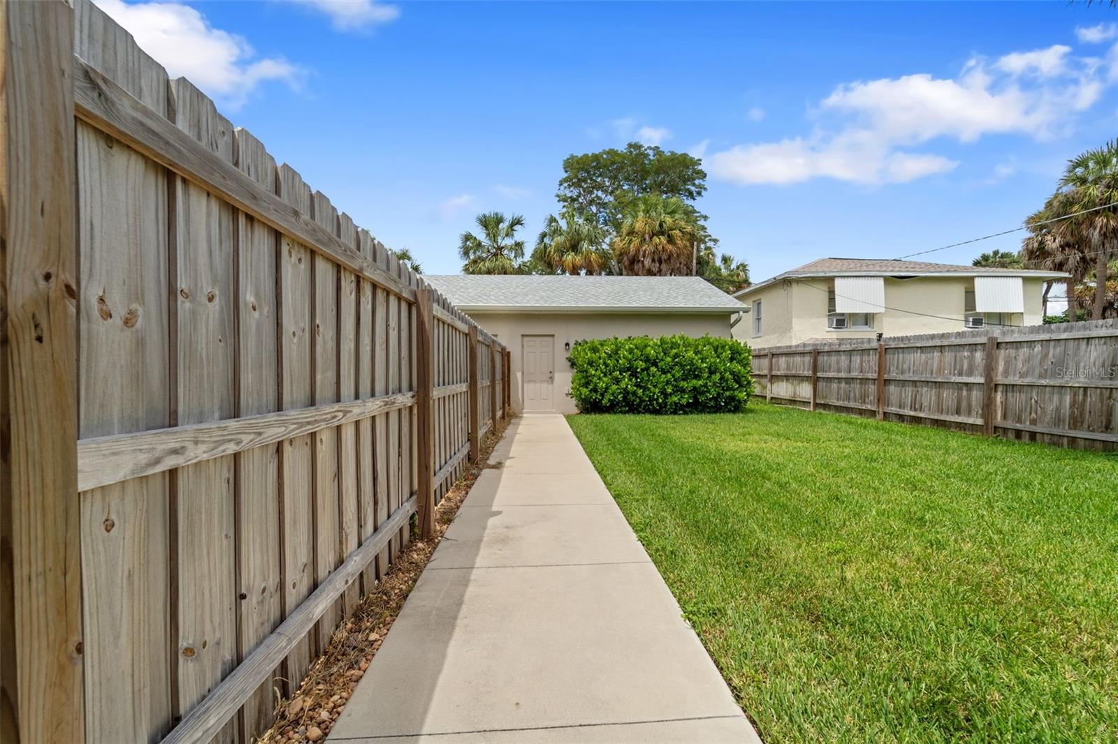 Pathway to Private 2-car garage