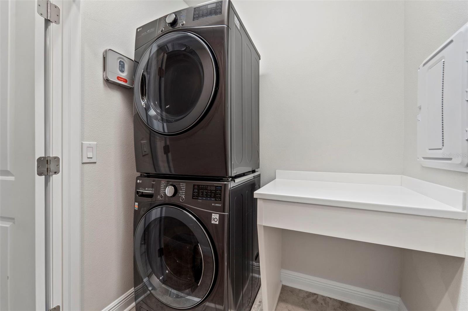 Upstairs Laundry with countertop