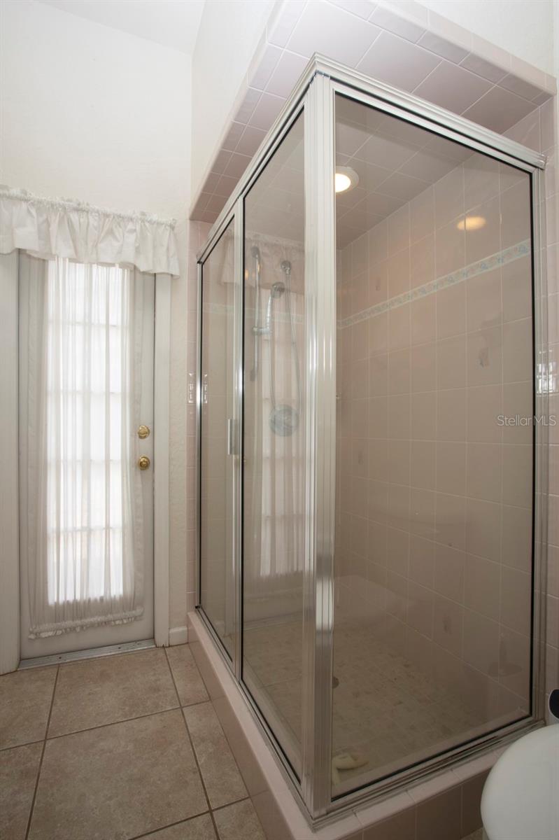 Convenient to the Pool is this lovely Guest Shower