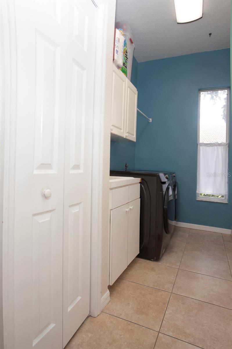 Convenient Inside Laundry Room with wash sink