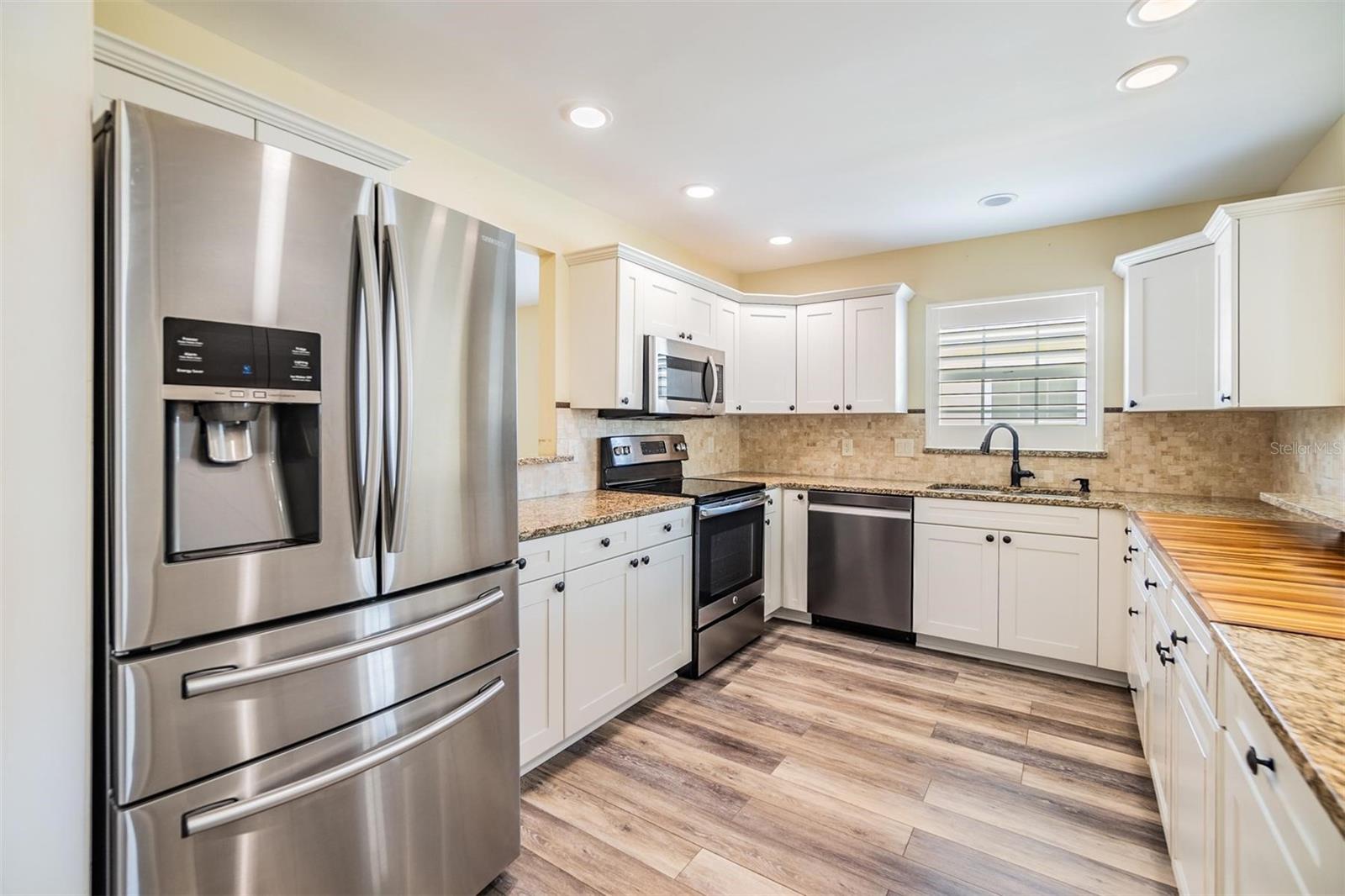 Kitchen with Includes French Door Refrigerator!