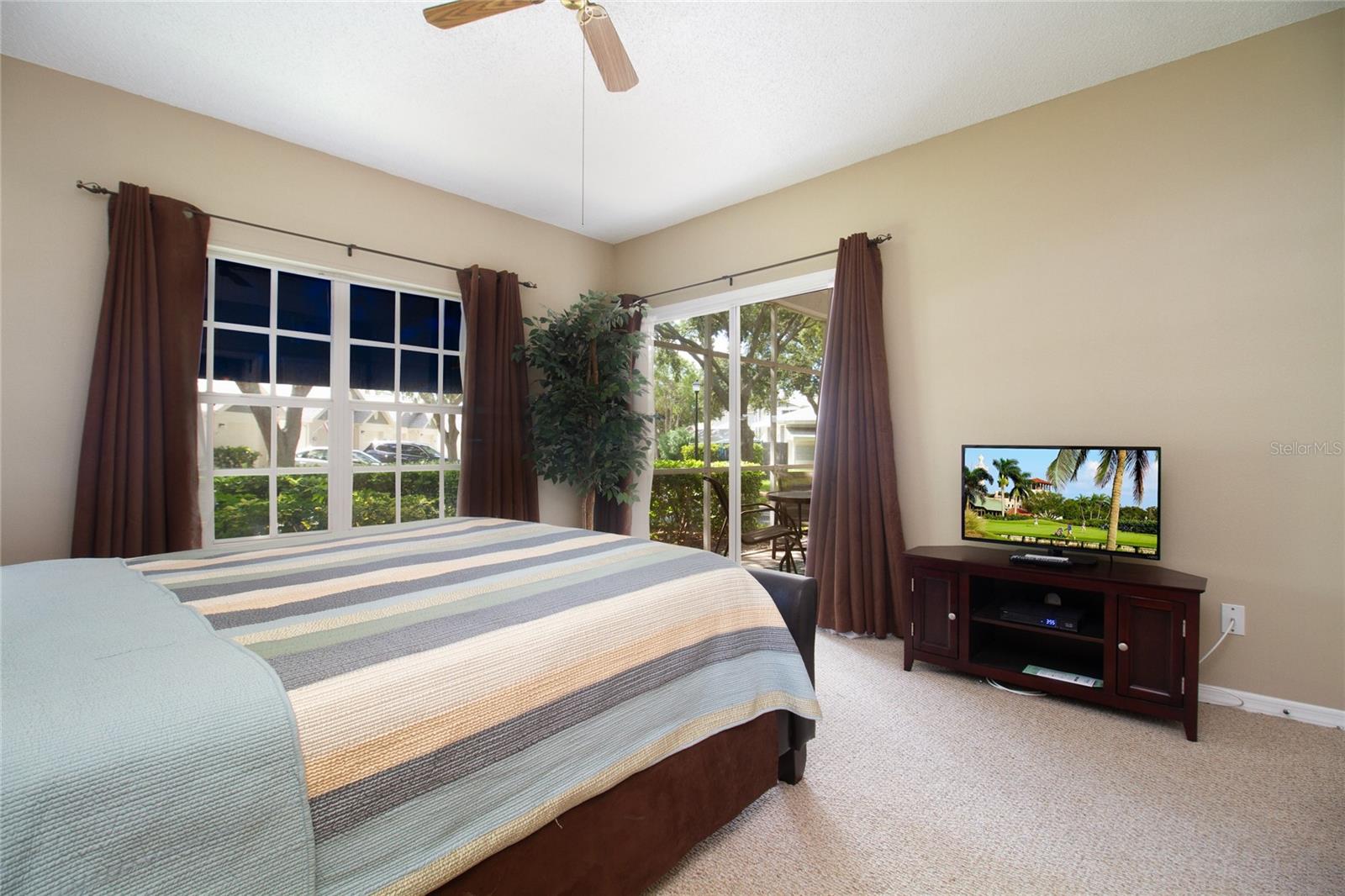 Master bedroom with a lot light.