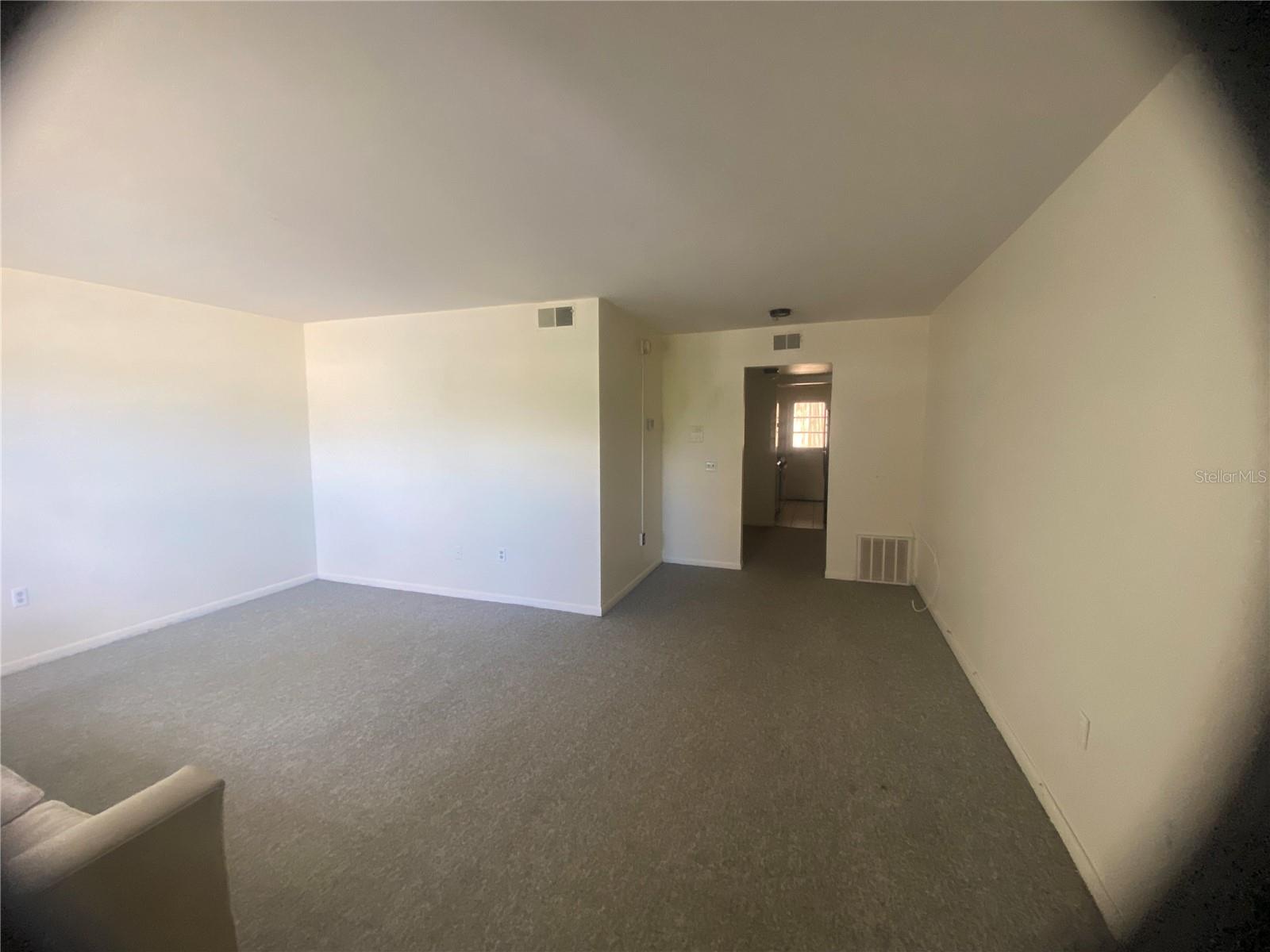 Your back is to the entrance door, facing the great room. the bath is to the left, past the great room, with the large bedroom just across from bath. Straight ahead is the kitchen and t hen large Florida room with storage closet