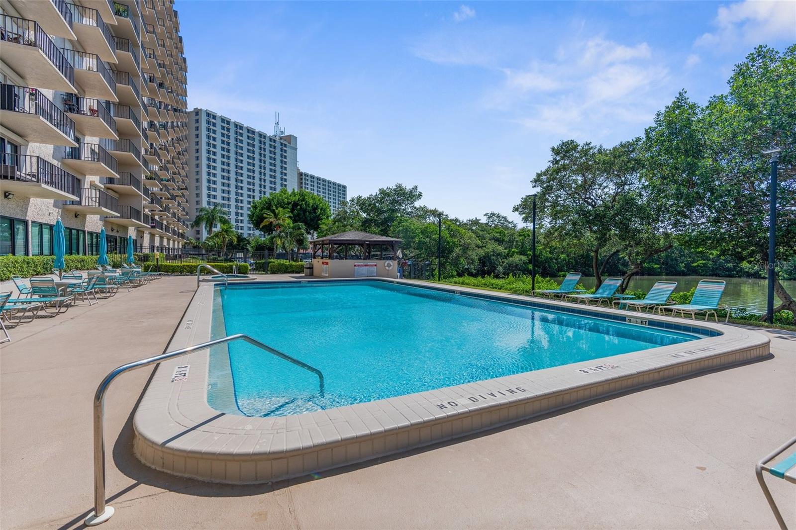 Community pool with grill and party area.