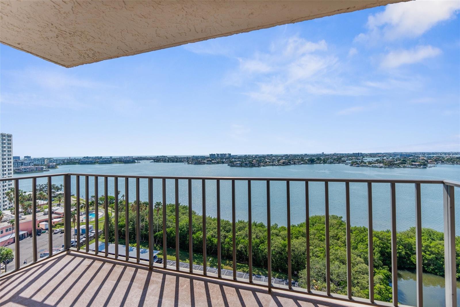 Private balcony facing the sunset and views of the bay and Gulf of Mexico.