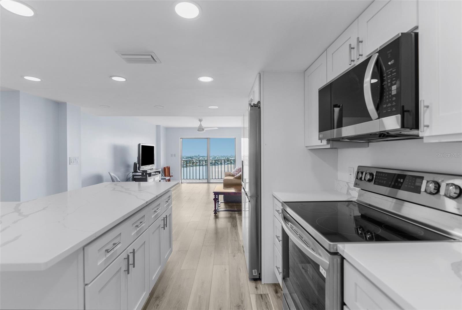 Views of the water towards the beach and sunset from the kitchen and living room!