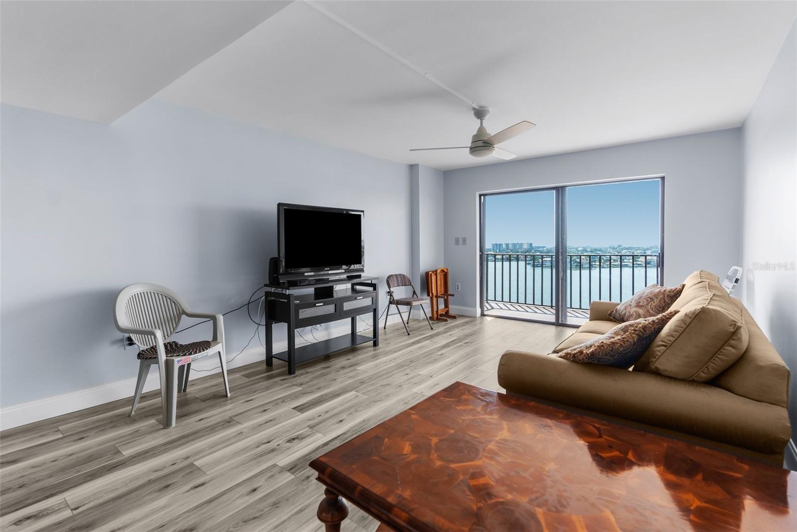 Large glass slider to the private balcony for enjoying the fresh air and the Gulf water views!