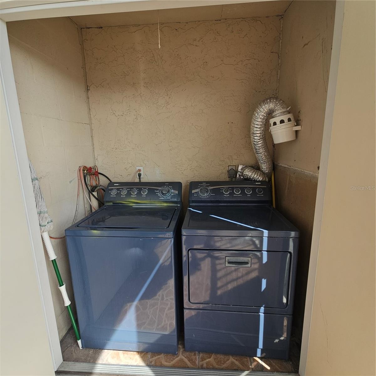 Washer & Dryer is located on the porch.