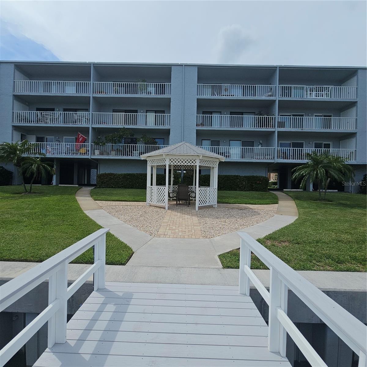 Gazebo located on the water side which leads to the dock area.