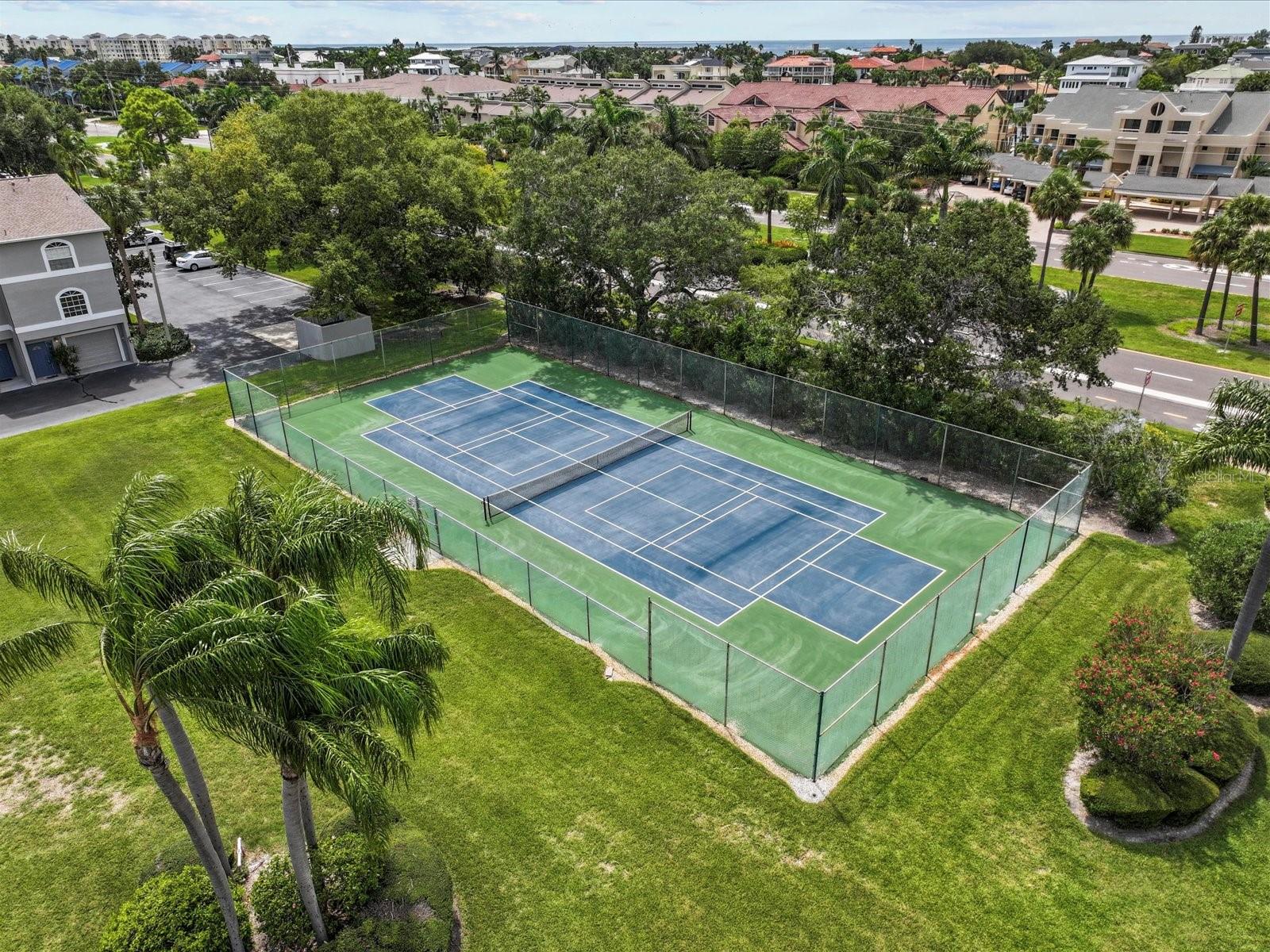 Tennis court also used for pickelball.