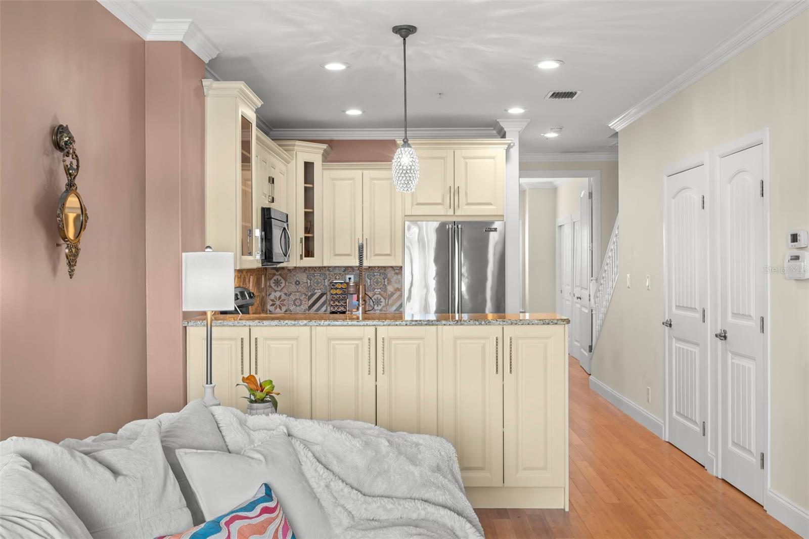 Cooking meets comfort in this stylish kitchen, complete with custom cabinets, granite countertops, and top-of-the-line Viking appliances. It’s perfectly integrated into the living space, making entertaining a breeze!