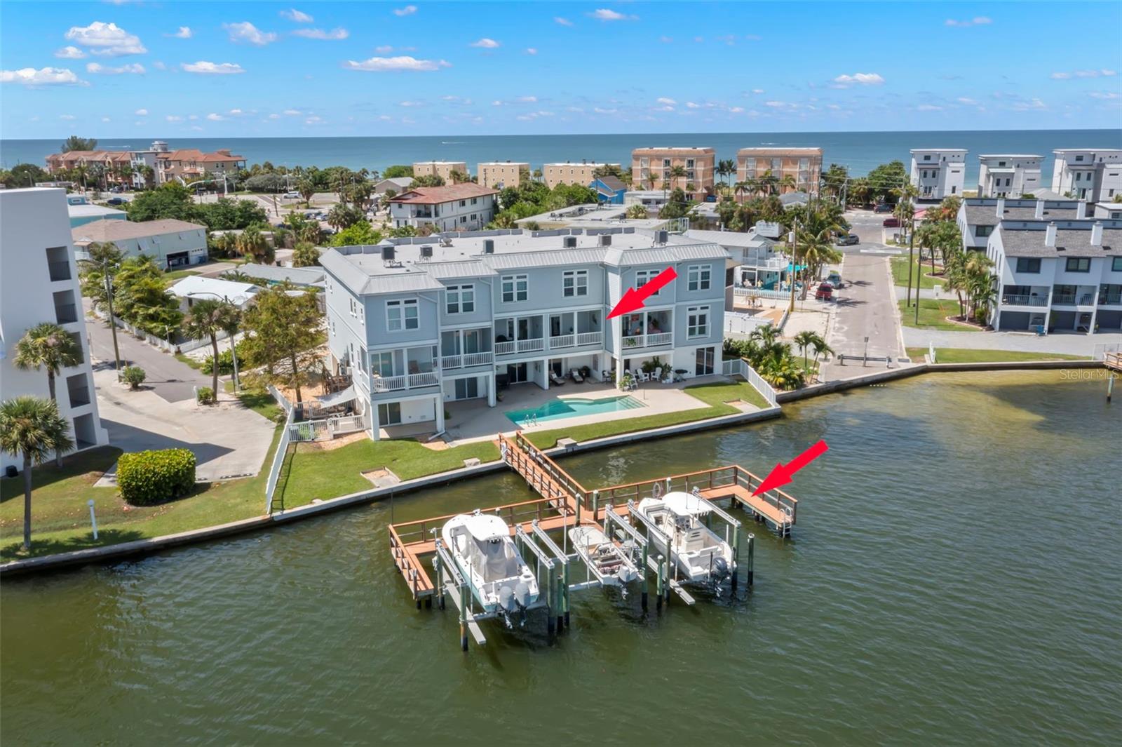 Discover the ultimate waterfront lifestyle! This townhome offers not only a spacious balcony for enjoying serene views but also a deeded boat slip just steps away—perfect for your nautical adventures!