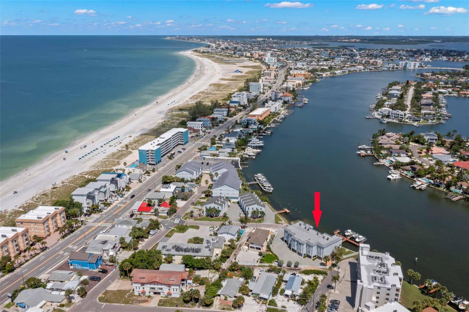 Experience the best of both worlds with this prime location, offering stunning views of the intracoastal waterway and just a short stroll to the pristine sandy beaches.