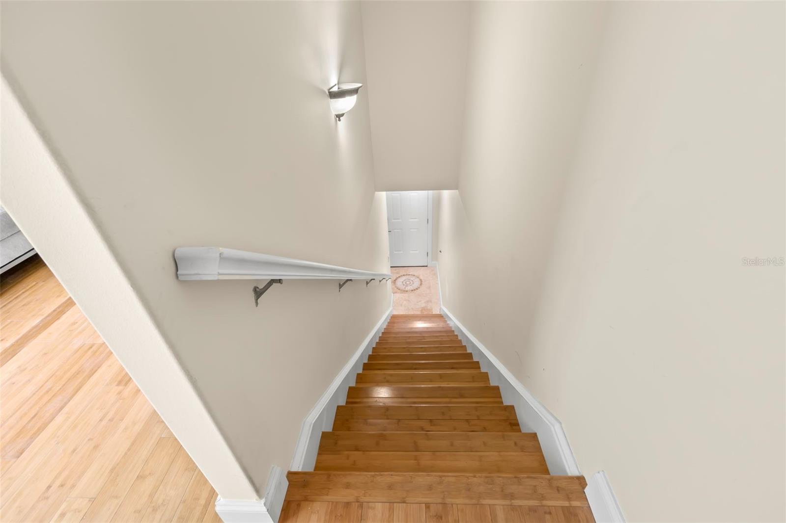 Stairway leading back to the main living level, seamlessly connecting the spaces in this welcoming home.