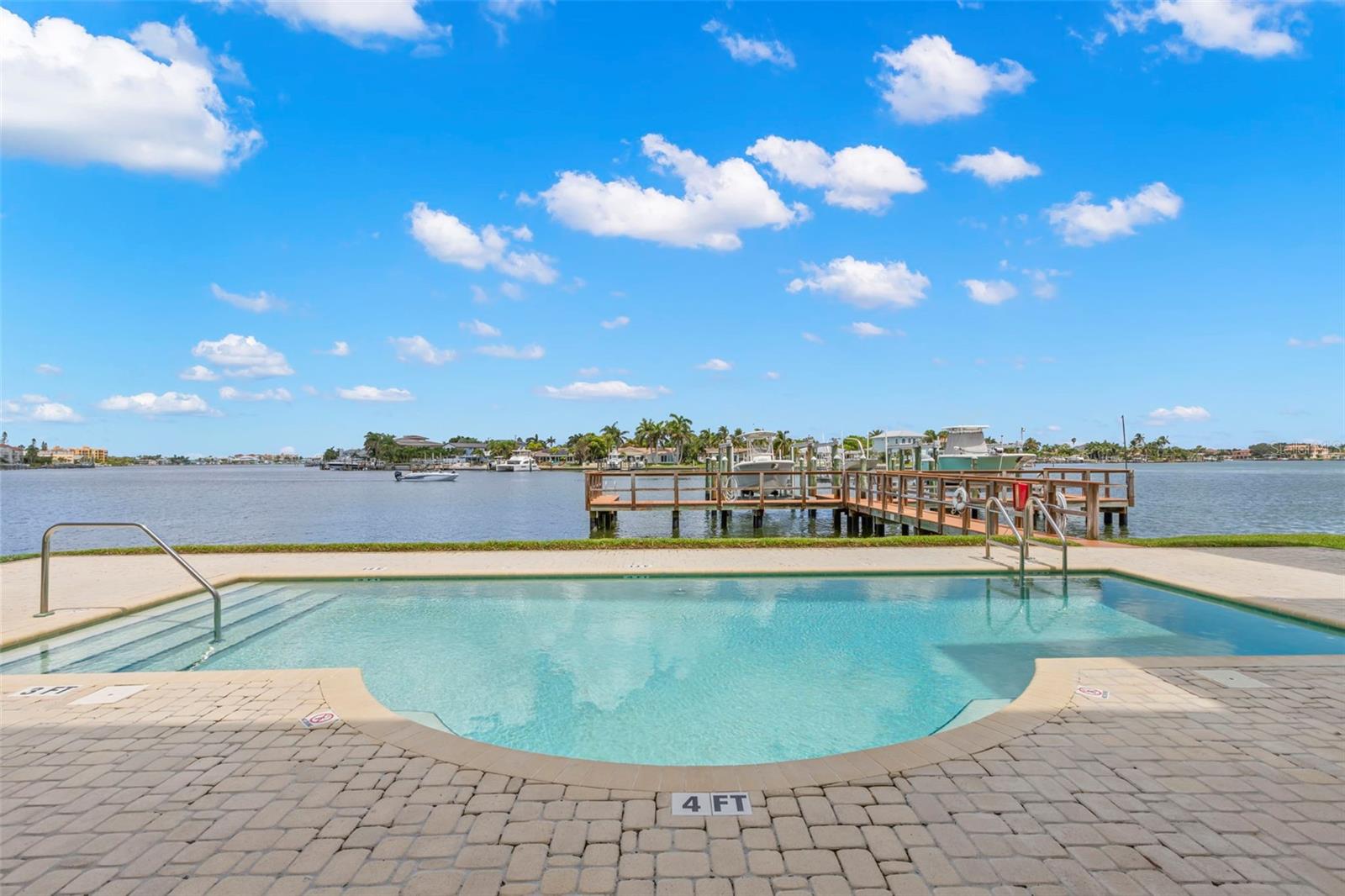 Unwind by the pool with stunning waterfront views, the perfect spot to soak up the sun and watch the boats glide by.