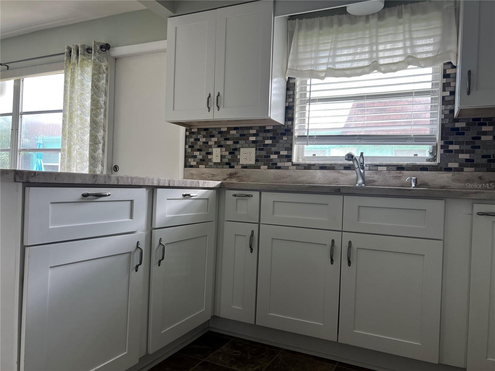 Kitchen with Shaker Cabinets and undermount sink