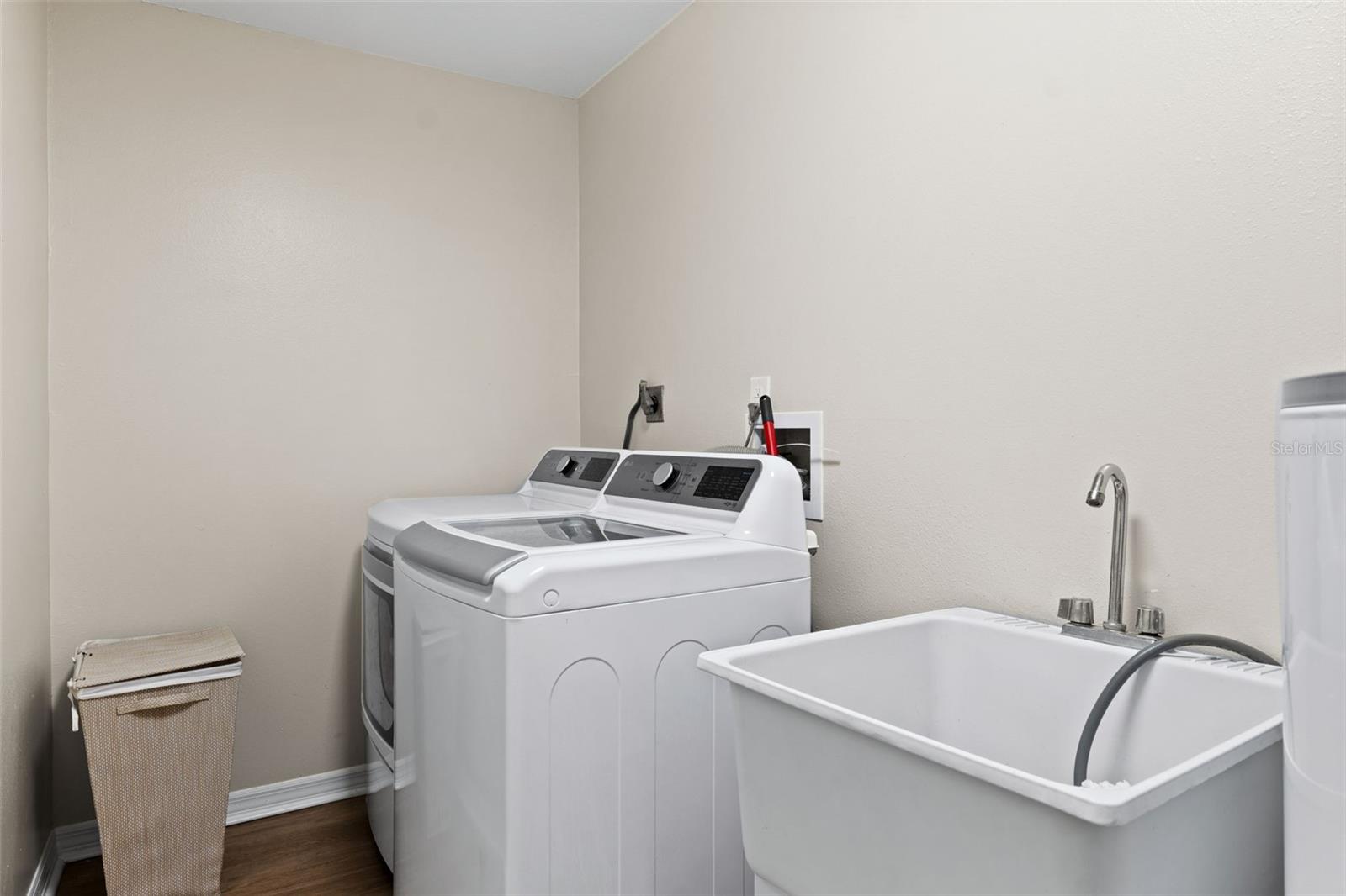 Large Laundry room next to dining room and garage