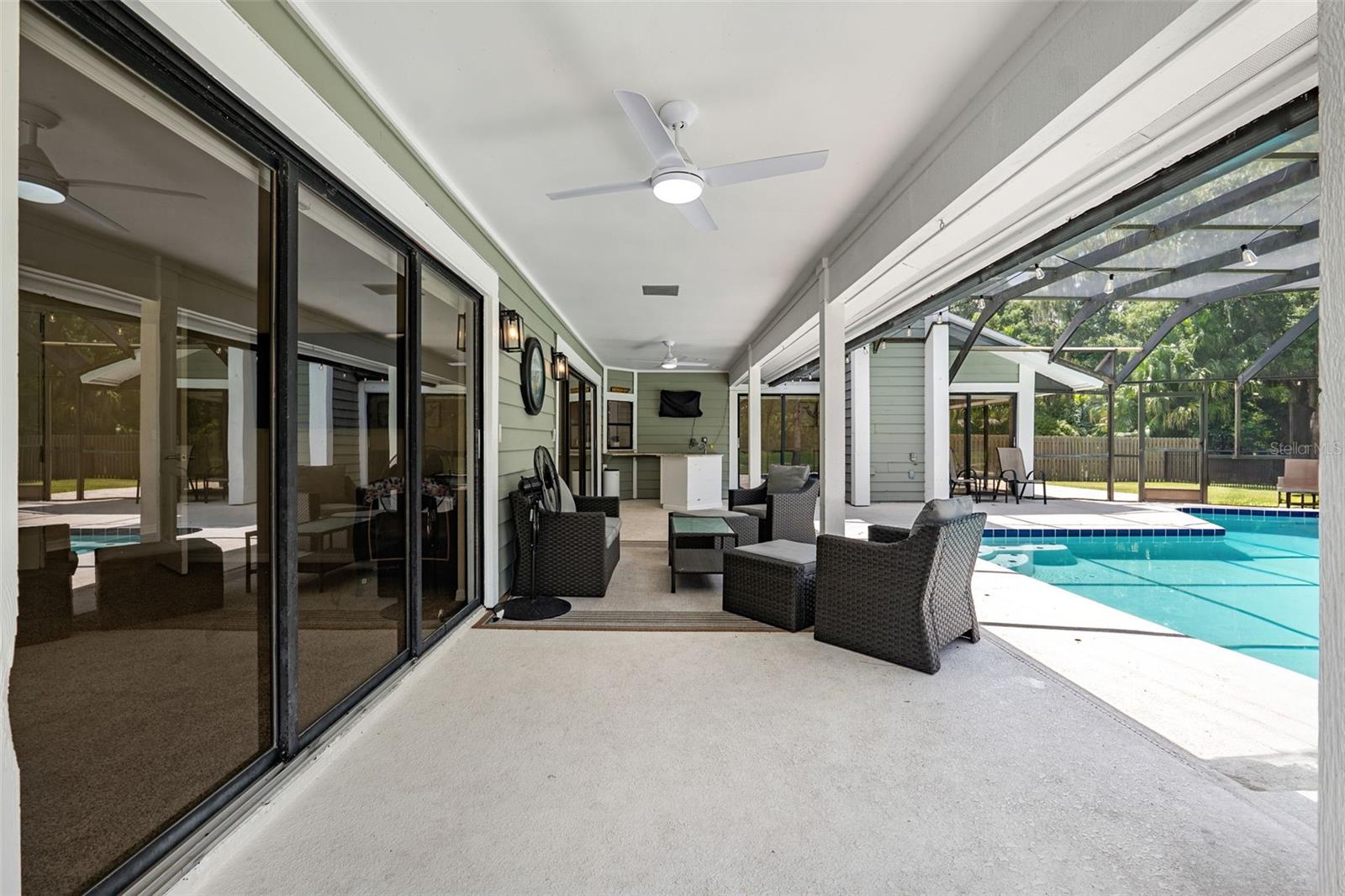 Primary Bedroom Sliders and pool area