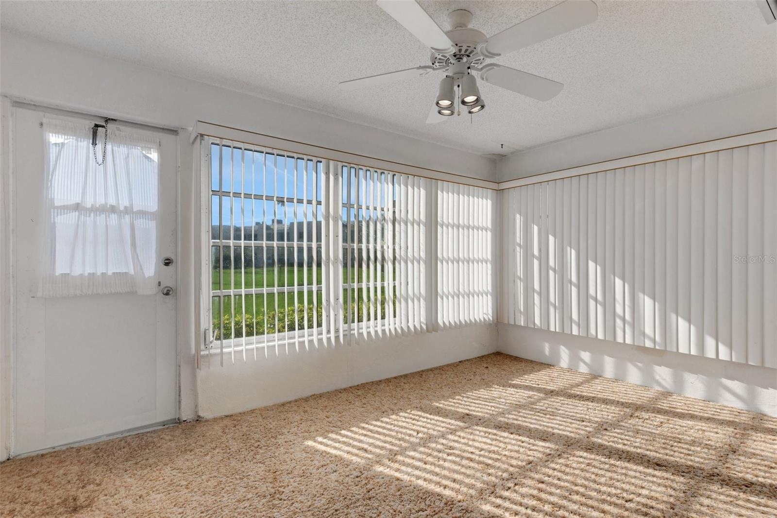 Florida Room With Pedestrian Door to Pool and Clubhouse