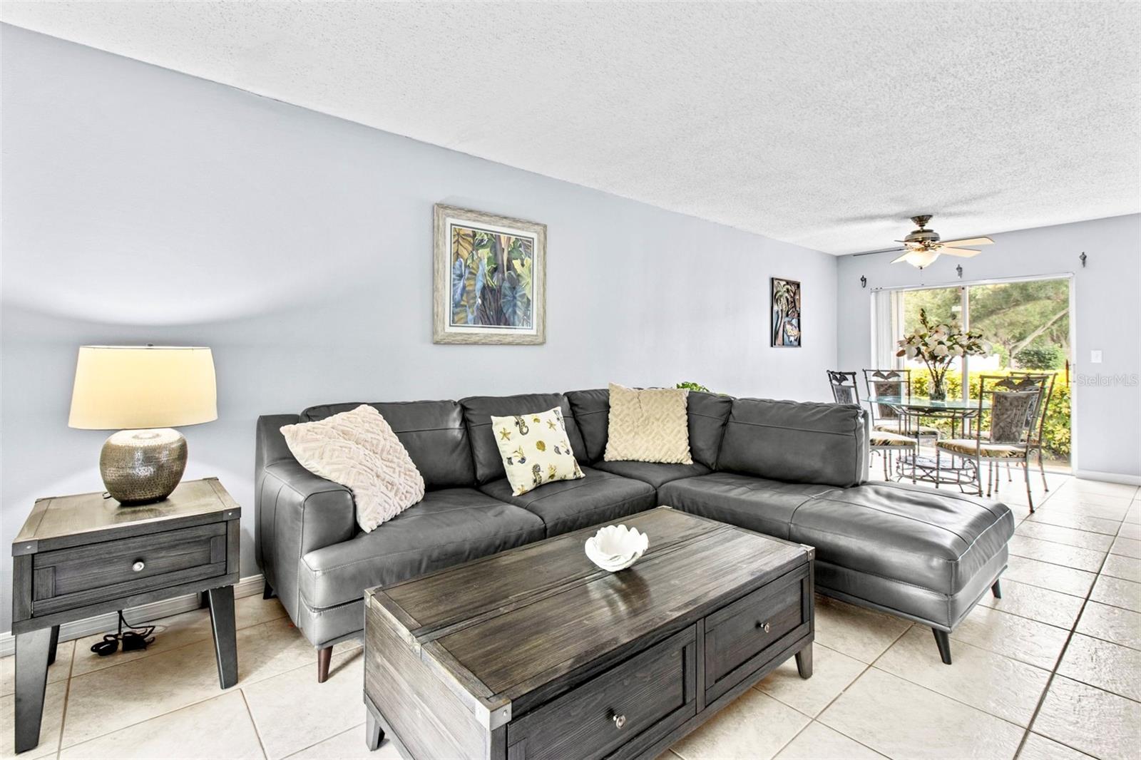 Living / dining area with sliders to open patio.