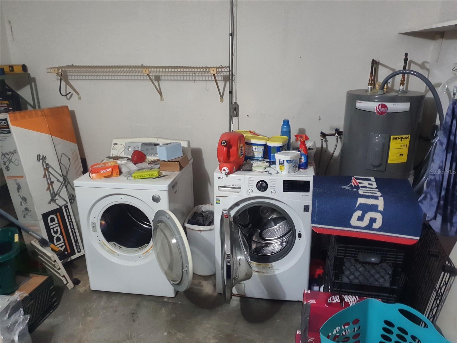 the laundry is just off the flex space in the garage