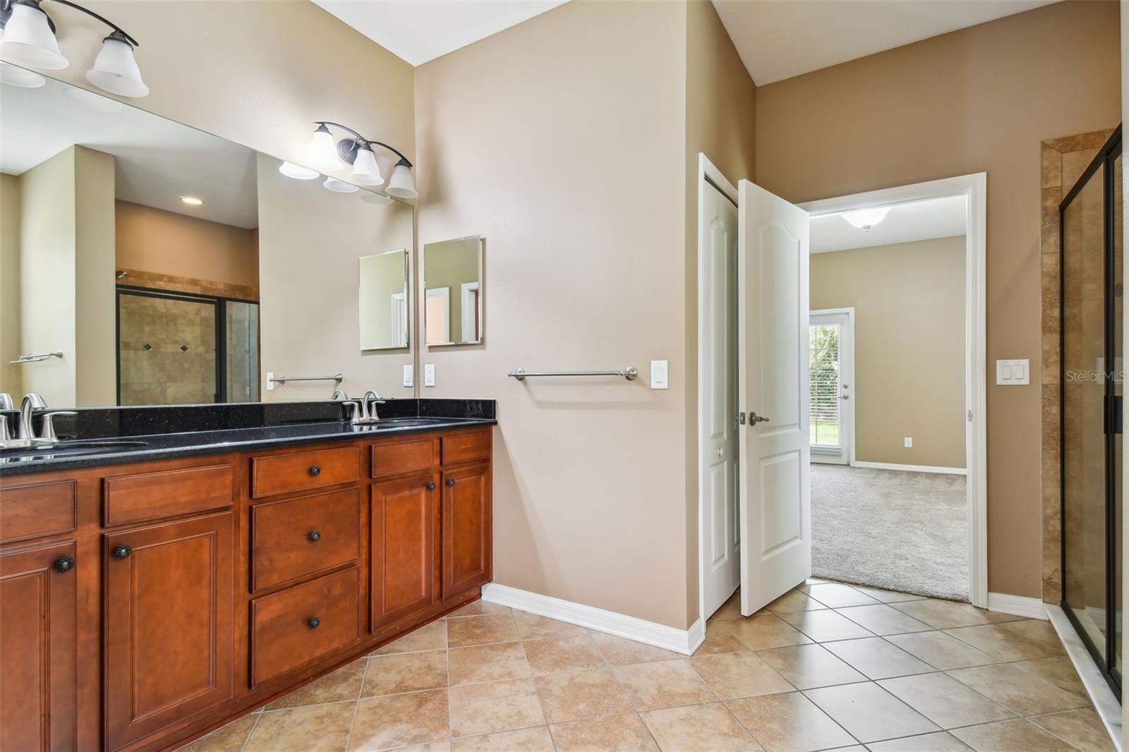 Dual vanity and shower