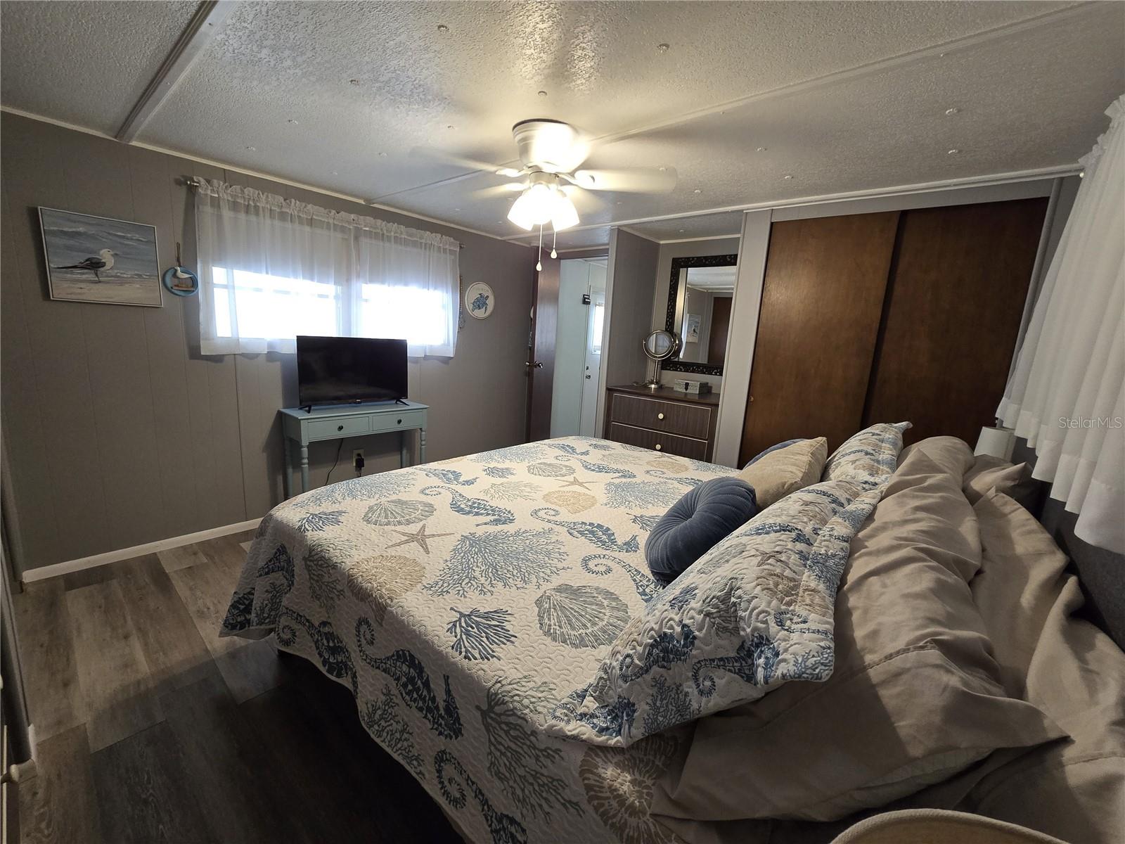 View of primary bedroom towards door