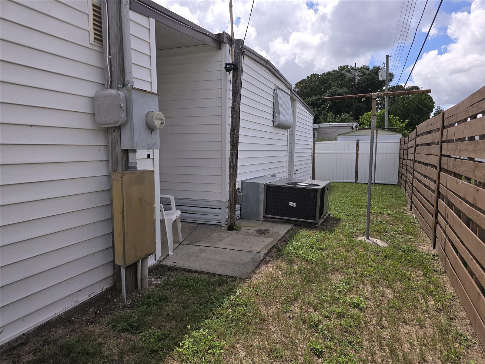 Backyard view from carport side