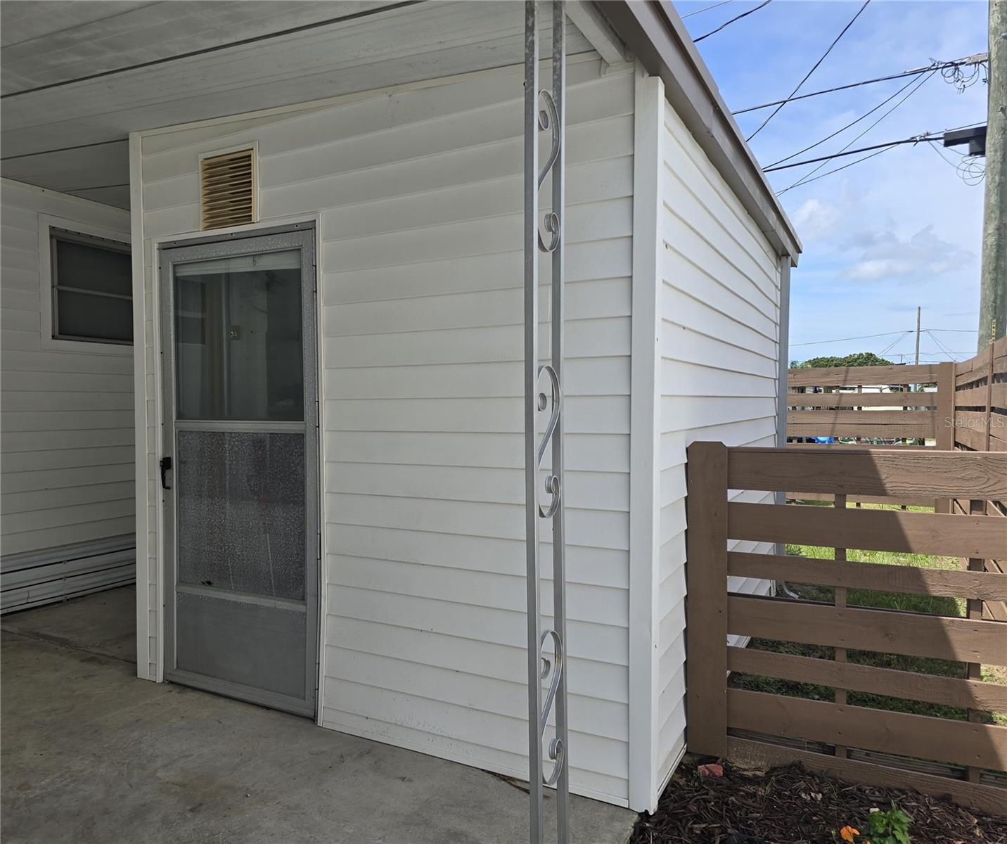 Storage room under carport