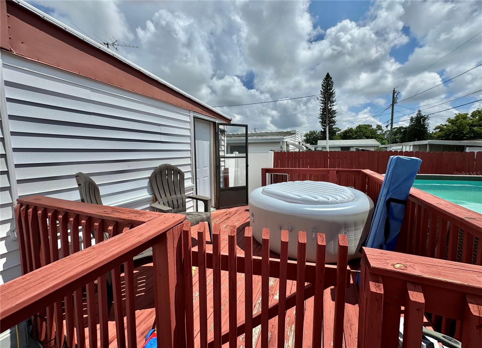 separate gated deck with private entrance to primary bedroom