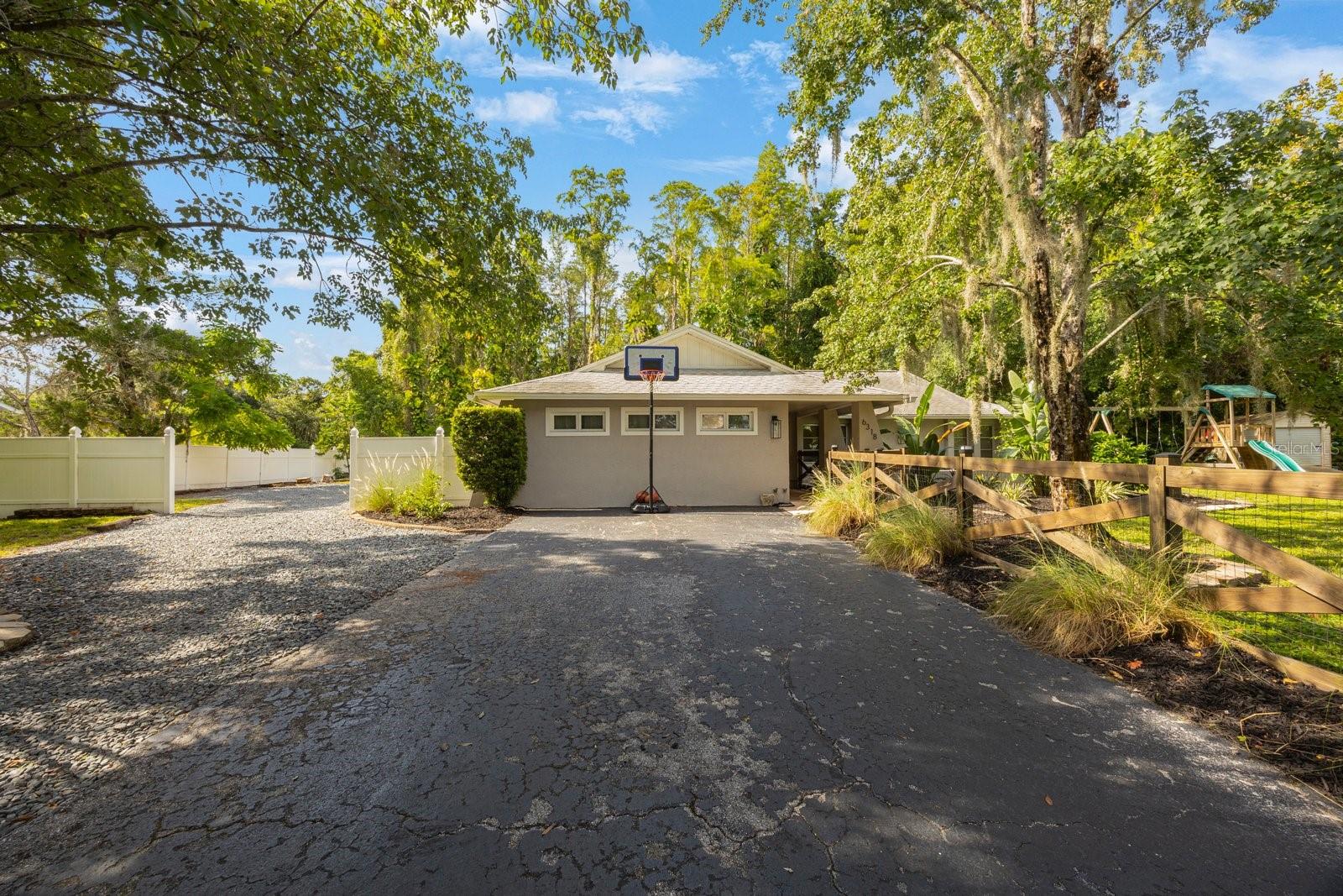 FRONT OF HOME WITH DRIVEWAY FROM STREET