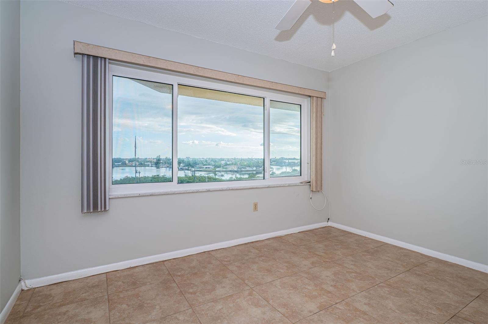 Primary Bedroom with hgh impact windows